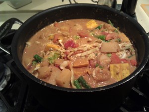 A large pot of peanuts, sweet potatoes, and goodness