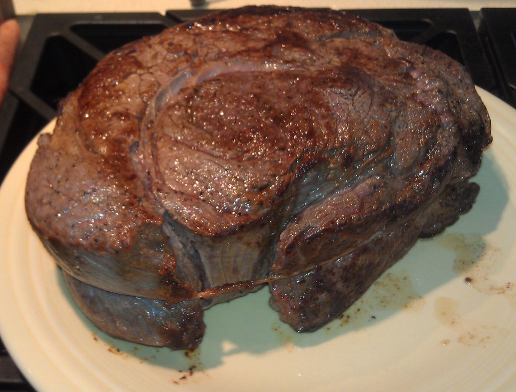 First, you brown the roast on all sides